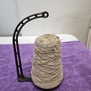 Counter top Cast iron string dispenser.